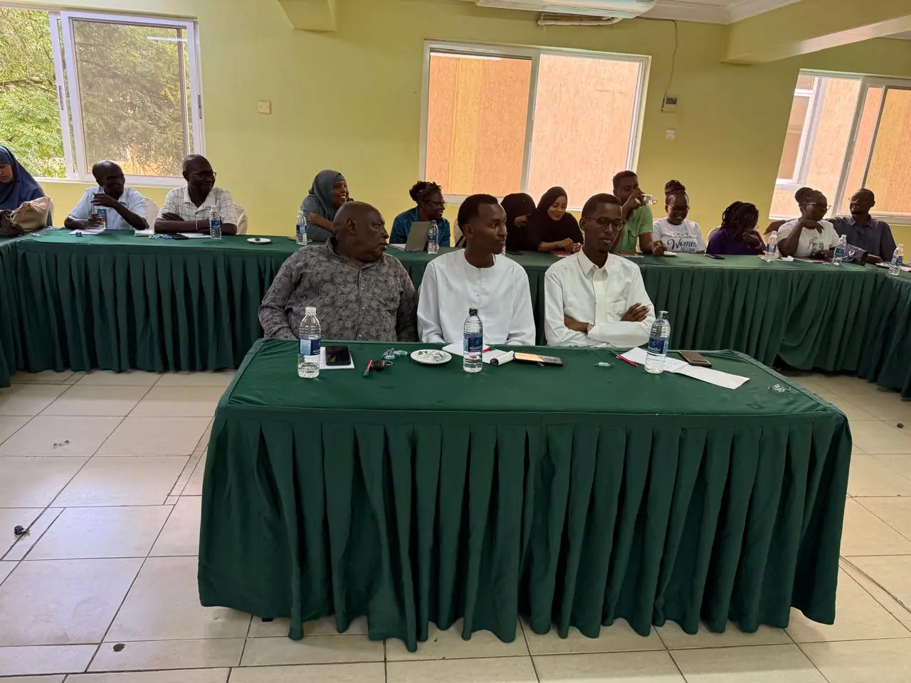 Community and project representatives taking part in a field engagement